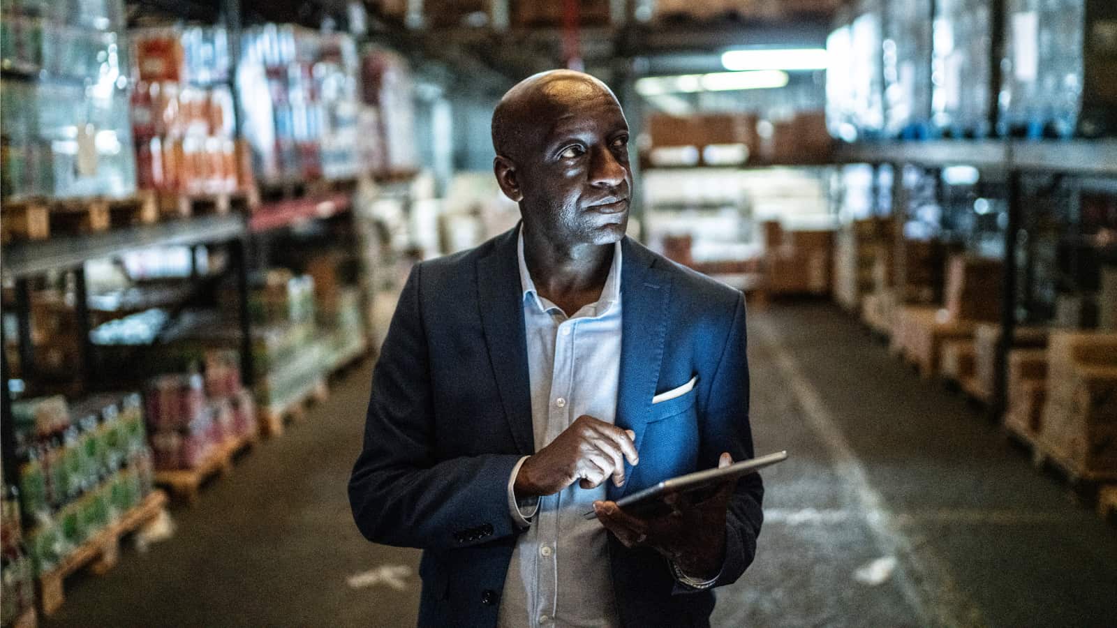 September 19th Blog male African-American business owner doing inventory walk-through